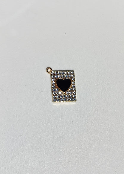 Charm en acier inoxydable avec cœur noir et paillettes pour personnaliser bijoux élégants.