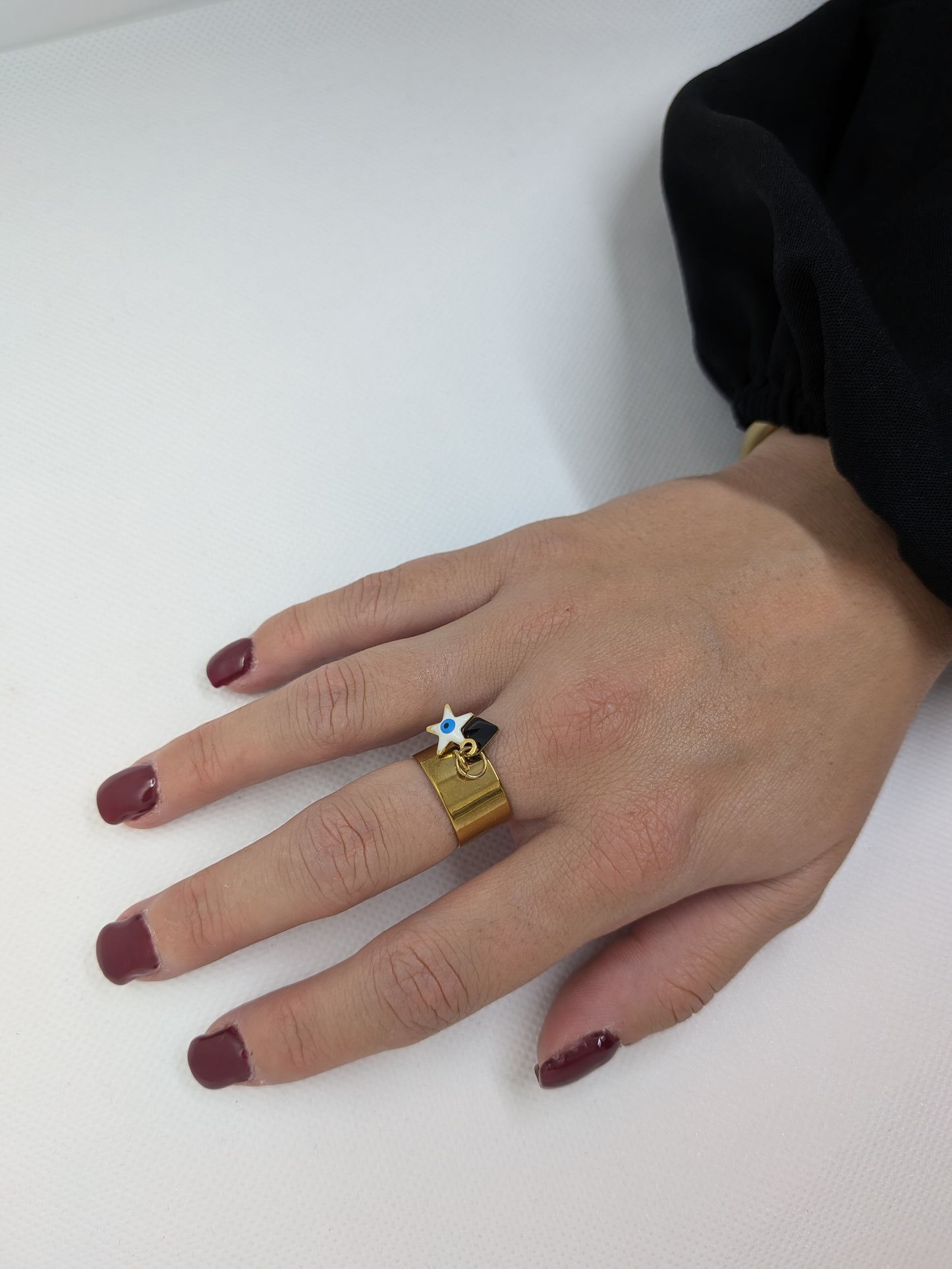 Bague doré charms étoile et noir